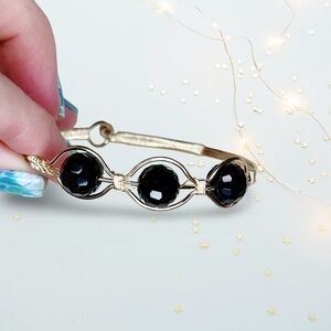 5167. Wire Black and Gold Bracelet